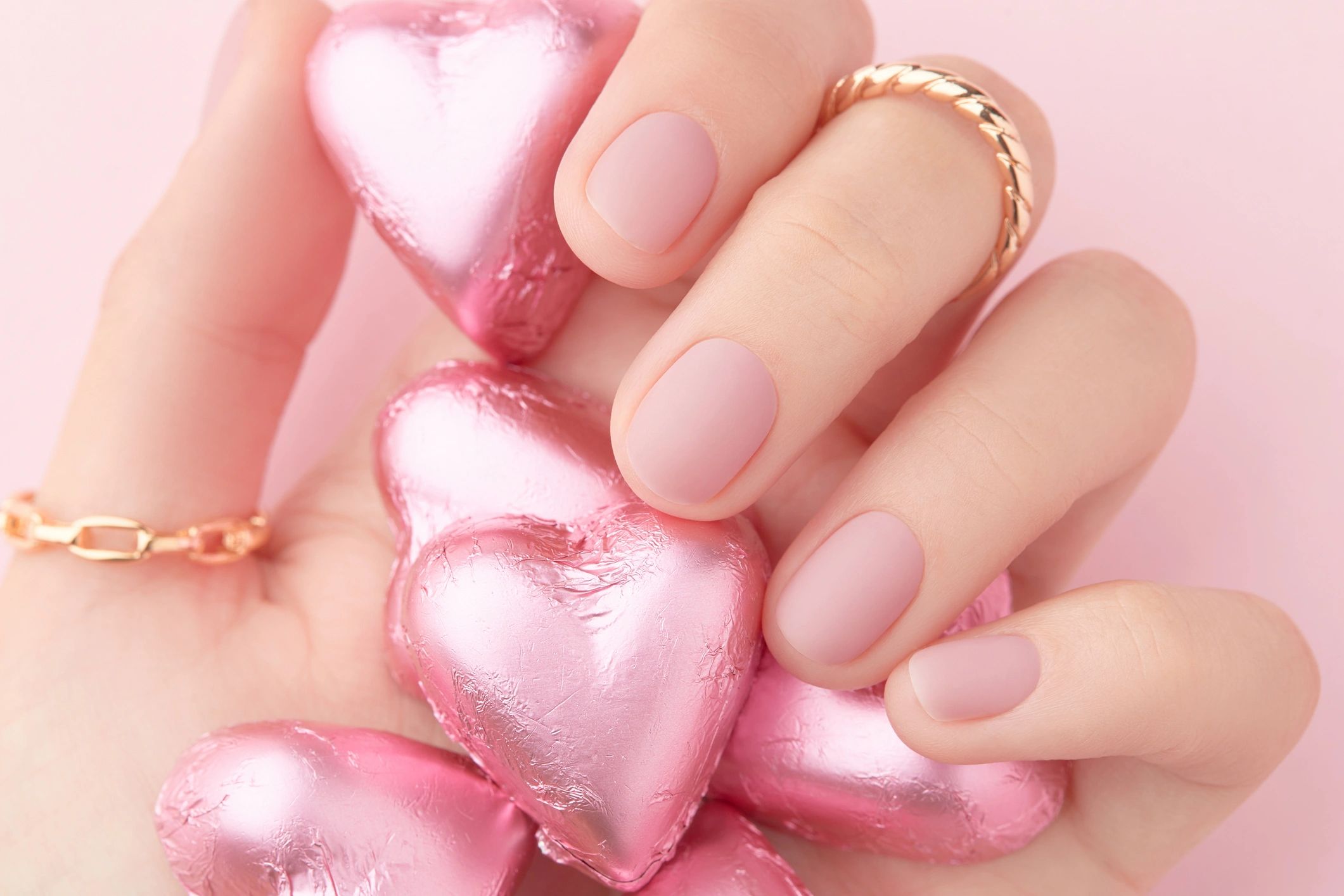 Close-up manicure detail representing a happy salon client
